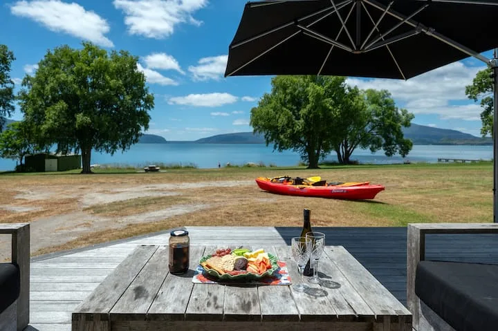 Lake Tarawera, spa, lawn to lake jetty & boatshed