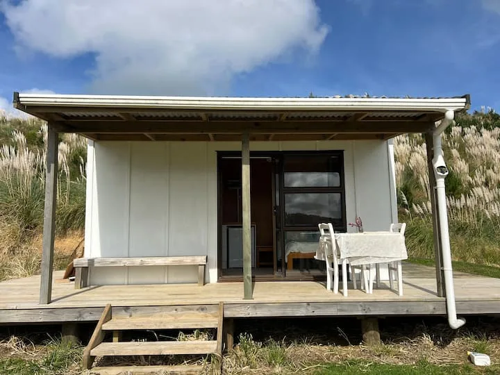 Off-Grid Cabin Escape with River. 
Kaipara Hills