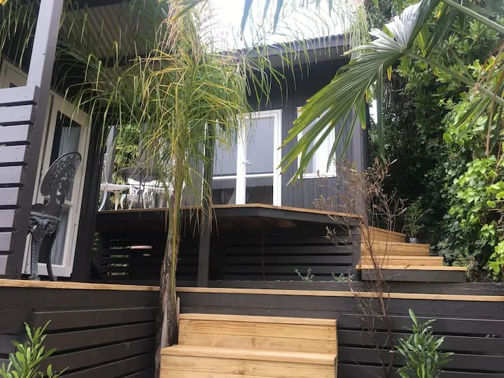"Queen Palm Cabins"  on Shakespeare
