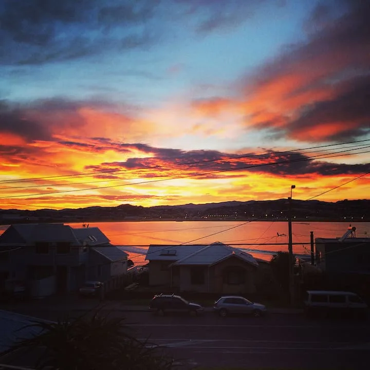 Relax at our sunny seaside Lyall Bay home