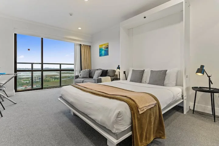 Skyline Sojourn Studio with Parking and Sea Views