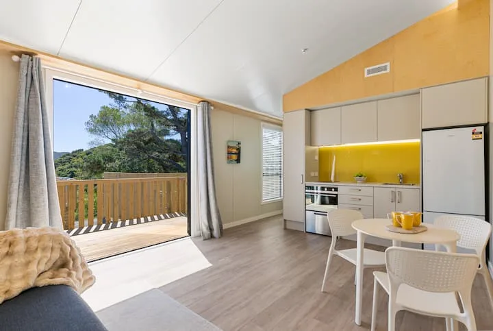 Walk to Porirua-city and rail or 20 mins to ferry.